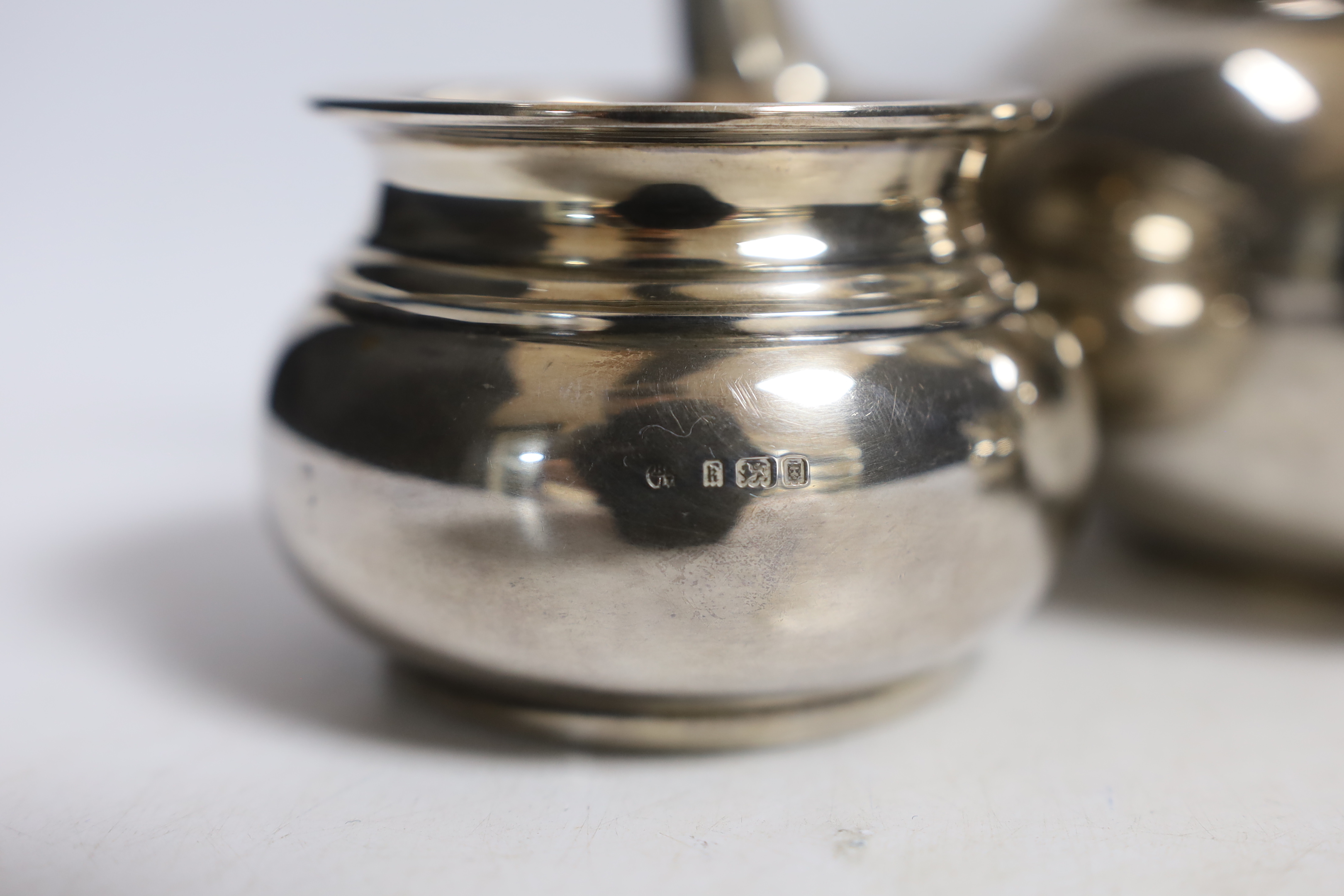 A George V silver three piece tea set, Blackmore & Fletcher Ltd, London, 1925